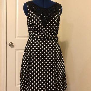 Black and white polkadotted dress.